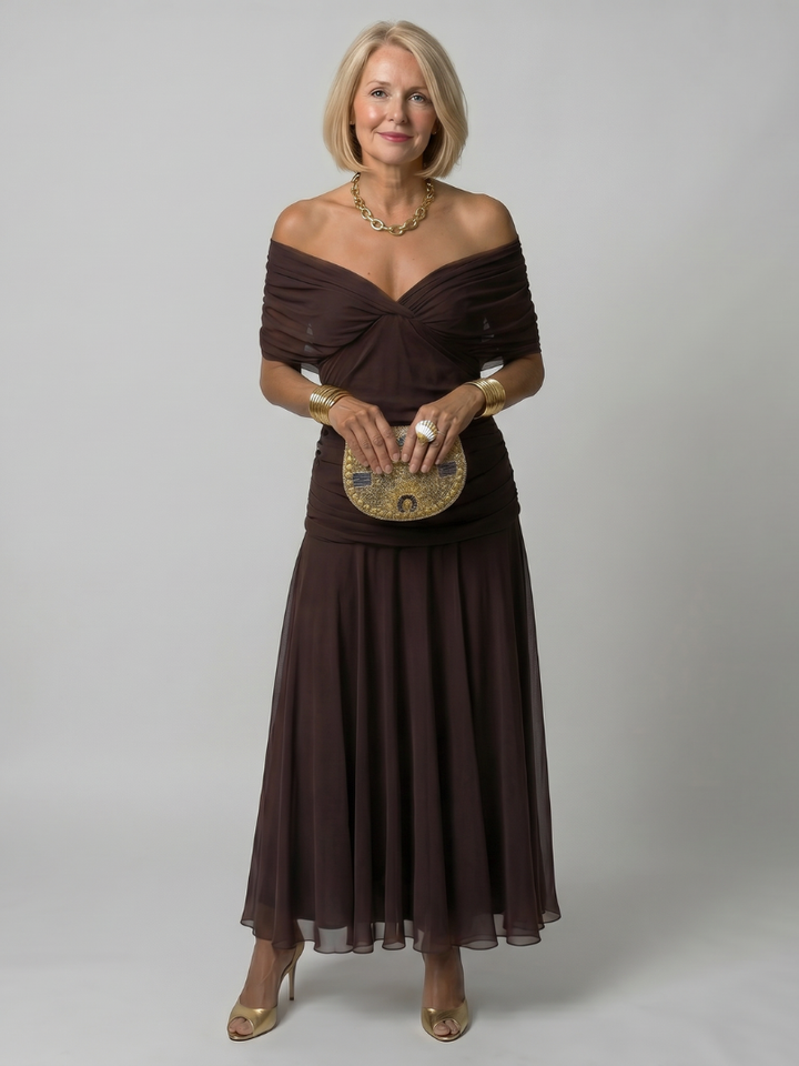 Calen | Flow Midi Dress" can be rewritten as "Calen | Midi Dress with Flowing Design.