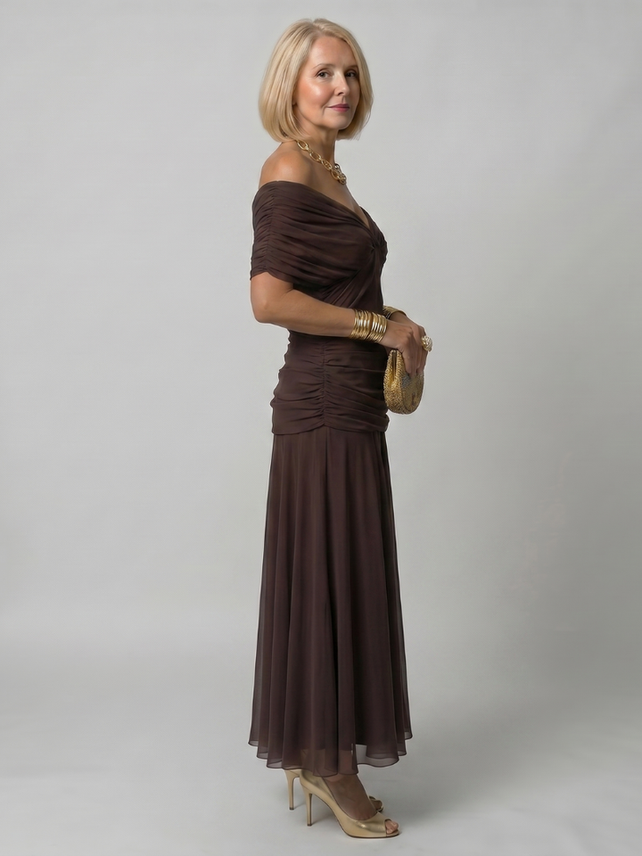 Calen | Flow Midi Dress" can be rewritten as "Calen | Midi Dress with Flowing Design.