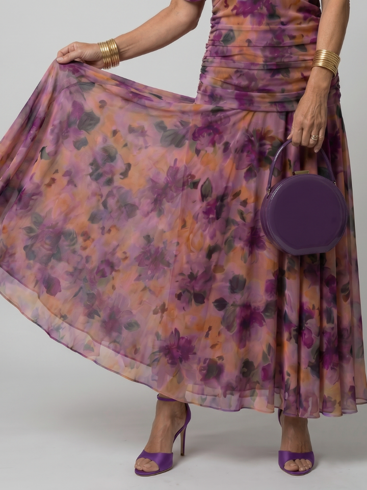 Calen | Flow Midi Dress" can be rewritten as "Calen | Midi Dress with Flowing Design.