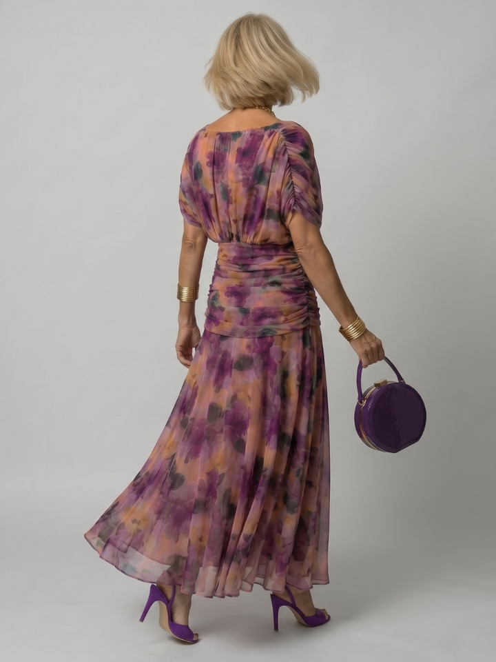 Calen | Flow Midi Dress" can be rewritten as "Calen | Midi Dress with Flowing Design.