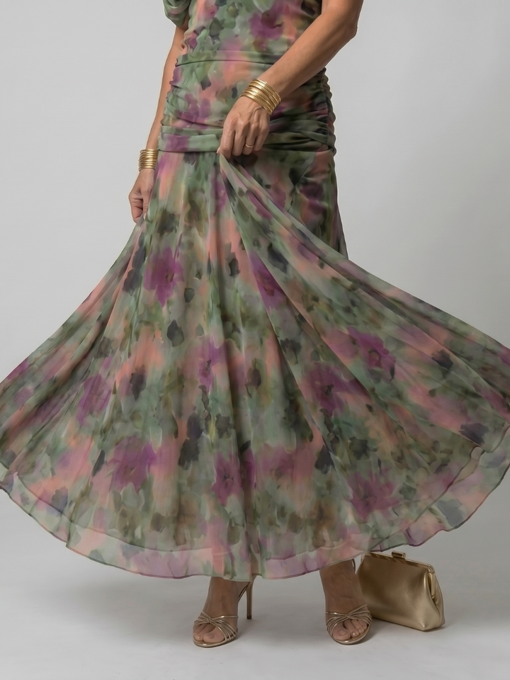 Calen | Flow Midi Dress" can be rewritten as "Calen | Midi Dress with Flowing Design.