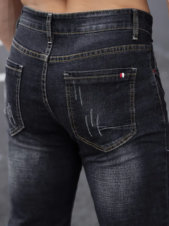 Savage Cut Tapered Jeans